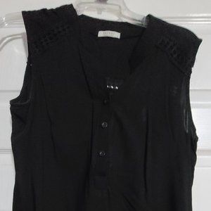 Black button up sleeveless top
